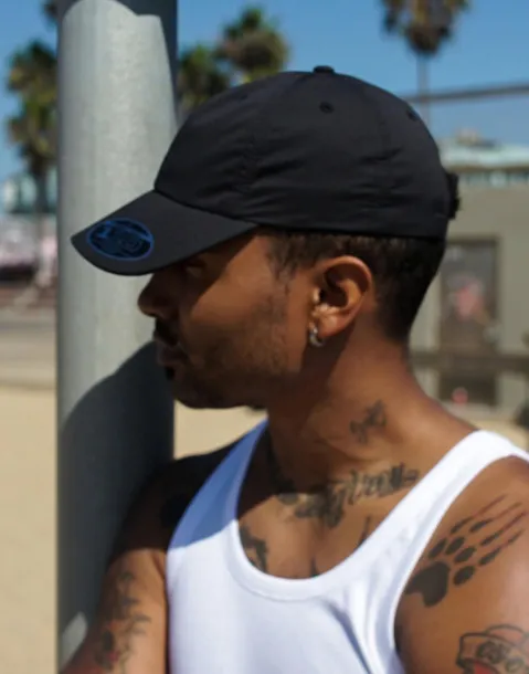  110 Curved Visor Snapback - Flexfit