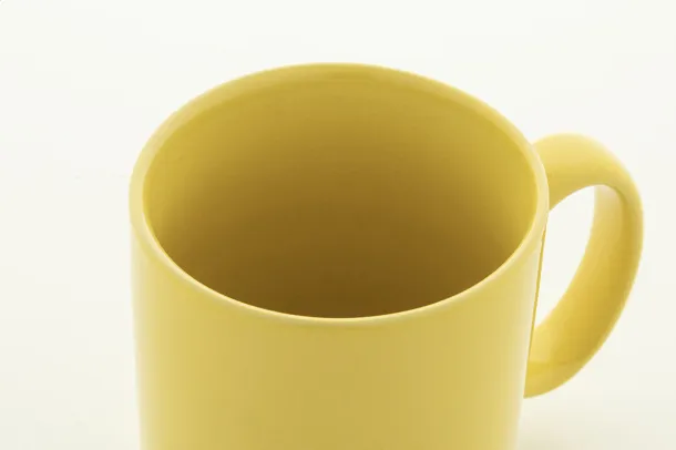 Kolomu coloured ceramic mug Yellow
